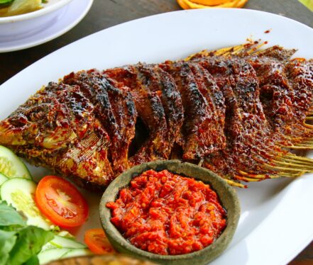 Unwind in our outdoor lounge with mouthwatering barbecue and the soothing touch of live music at Fun Capitol
